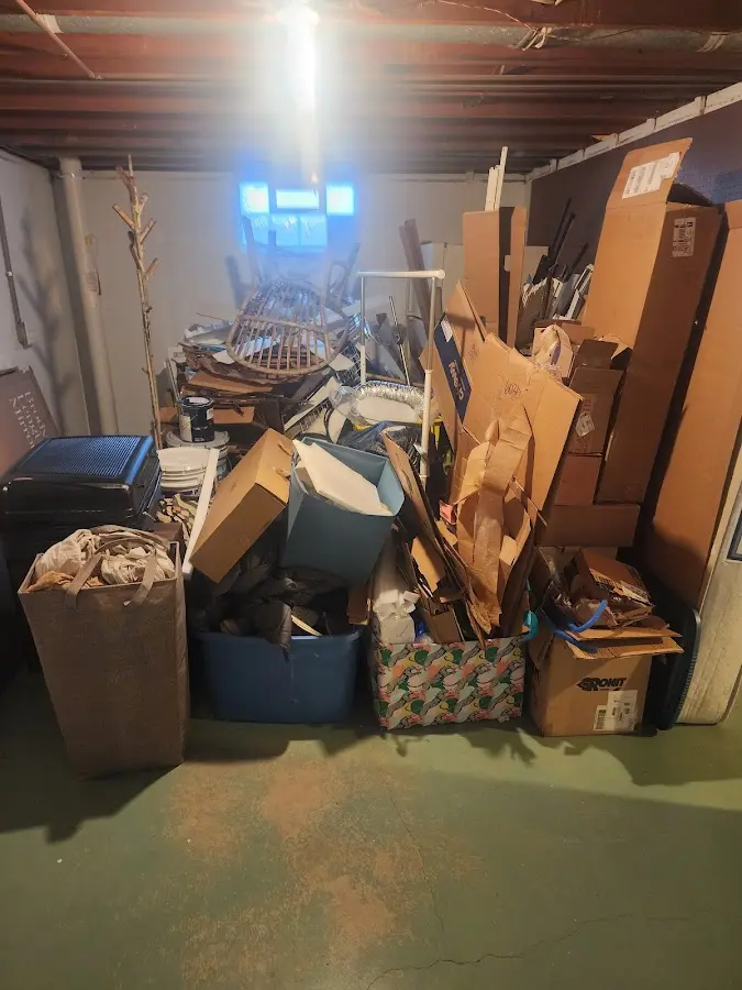 Roll-off dumpster container at job site for 4 Yard Dumpster Rental in Saranac